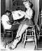 Virginia Mayo, black and white photo from behind the scenes of 1953 movie "She's Back On Broadway"