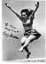 Peggy Moran. Black & white photo of jumping in air